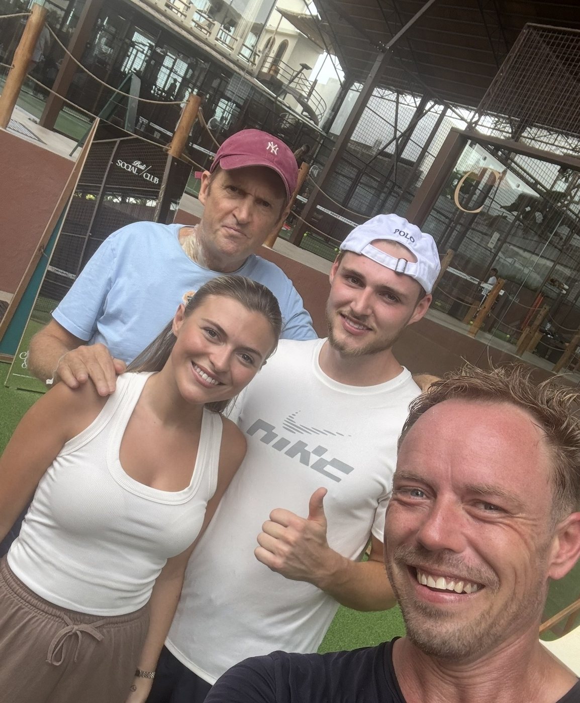 Darren with friends at a padel club
